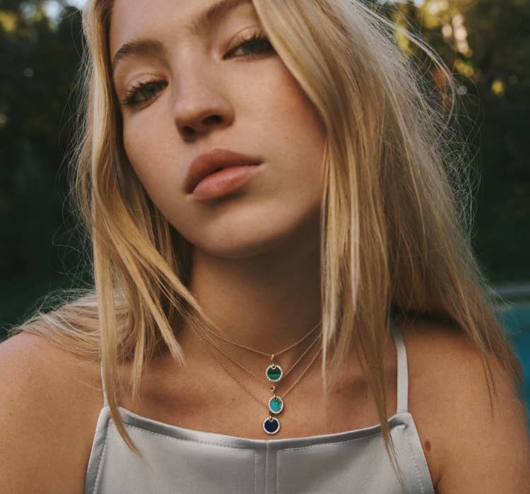 An image of Lila Moss wearing petite DY Elements necklaces.