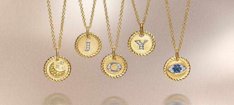 David Yurman amulets spelling Joy.