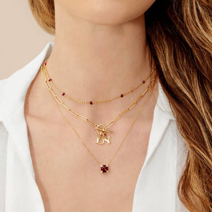 Model Wearing David Yurman Stack of Necklaces