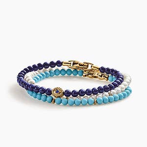 Three David Yurman beaded bracelets.