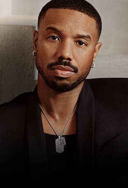 Michael B. Jordan posing in David Yurman Chevron jewelry.