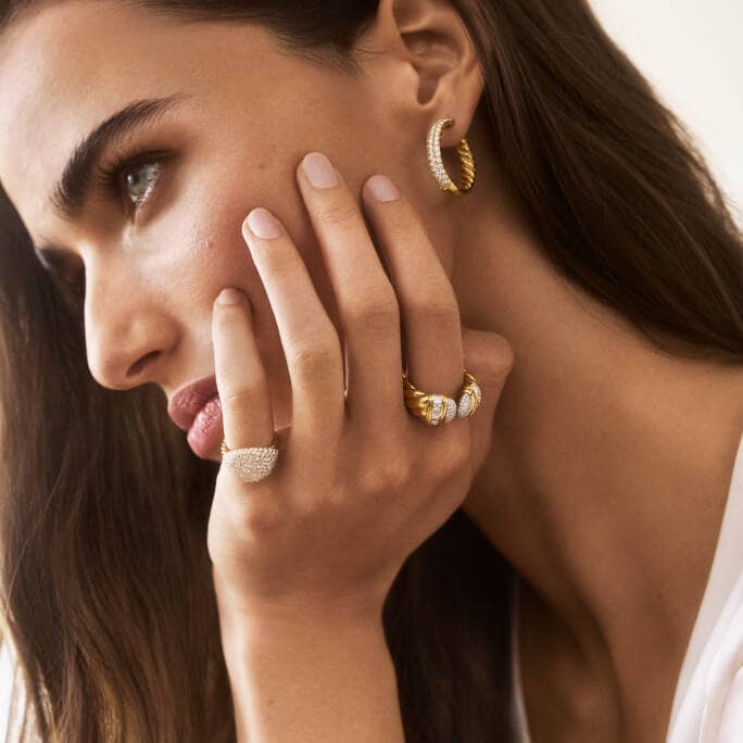 A model wearing David Yurman jewelry.