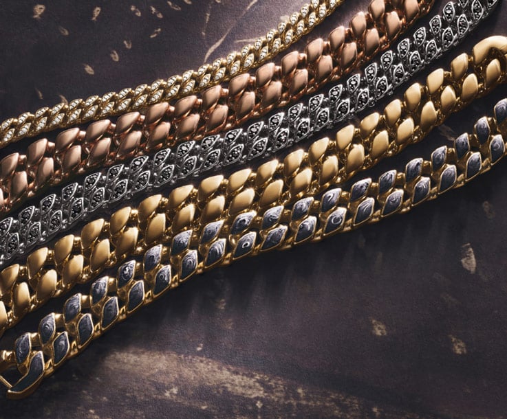 An image of five chain bracelets.