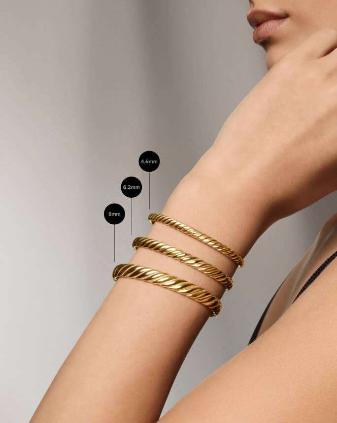 Three David Yurman Sculpted Cable bracelets widths.