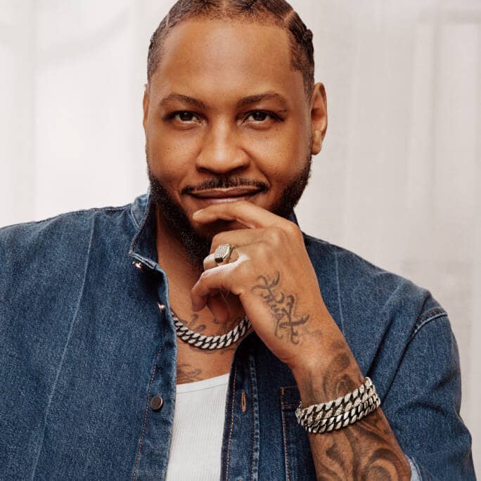 Carmelo Anthony posing in David Yurman jewelry.