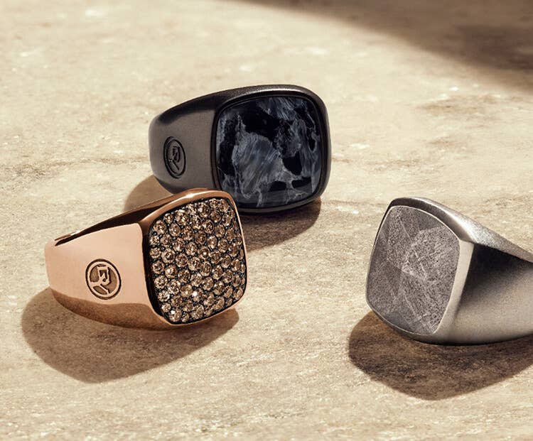 An image of three men's signet rings.