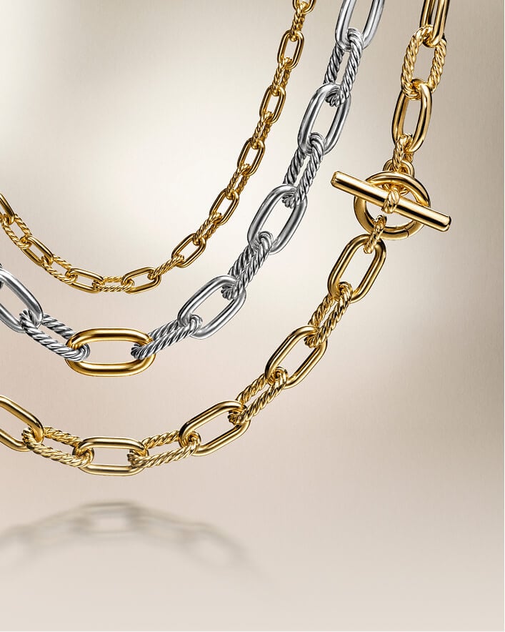 Three David Yurman women's chain necklaces.