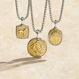 Three David Yurman Amulets with mixed metals.