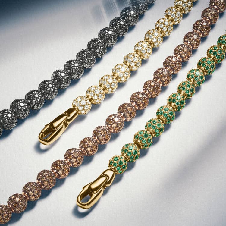 An image of David Yurman gold pave spiritual bead bracelets.