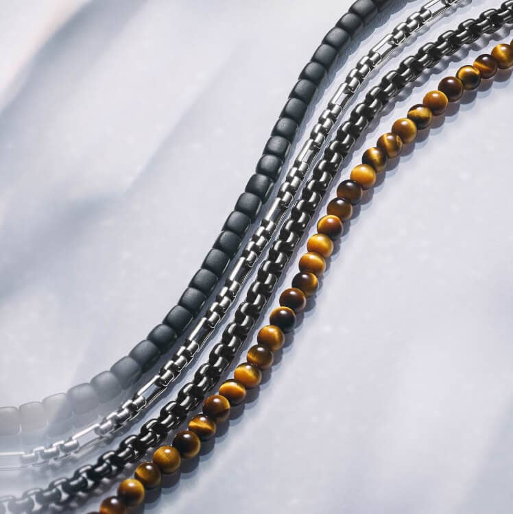 An image of David Yurman necklaces and chains.