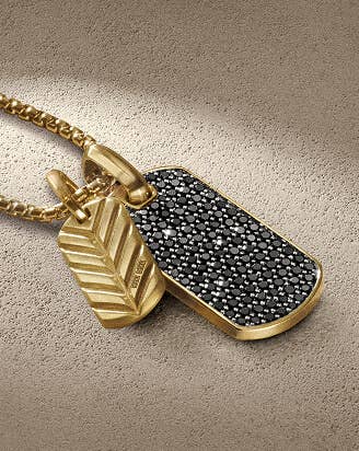 A necklace with gold tags from the David Yurman Chevron Collection.