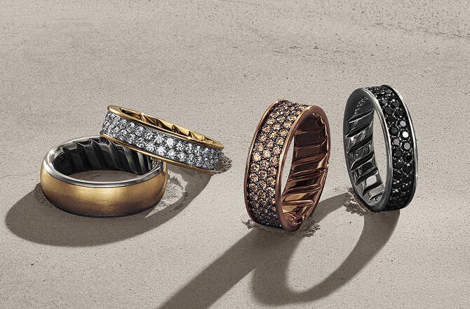Four David Yurman Streamline band rings.