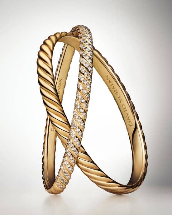 An image of two Sculpted Cable bangle bracelets.