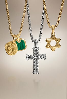 Five David Yurman amulets on chains.
