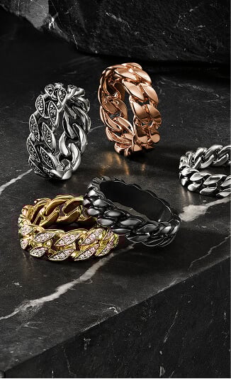 Five David Yurman rings for men.