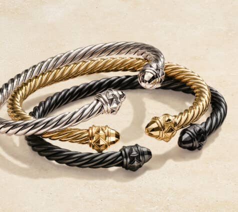 A collection of 3 David Yurman Cable Bracelets.