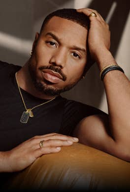Michael B. Jordan posing in David Yurman Chevron jewelry.