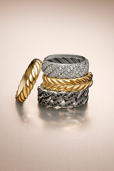 Four David Yurman rings for men and women.